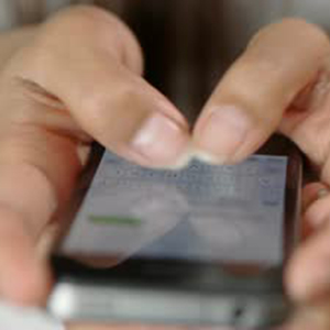 stock-footage-texting-woman-on-a-iphone-smartphone-device