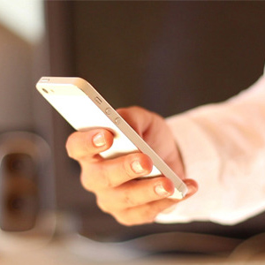 Women is Using Touch Screen Smartphone - 3-590x300