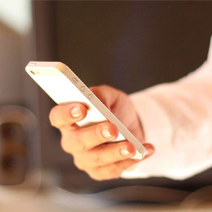 Women is Using Touch Screen Smartphone - 3-590x300