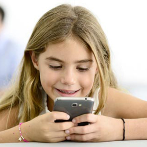 mobile-blog-smiling-young-girl-playing-with-smartphone